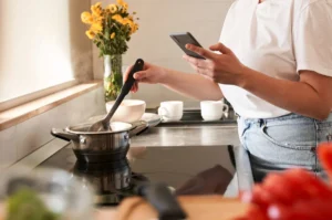 The Hidden Dangers of Phone Use While Cooking: Unsanitary Risks Revealed